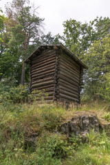 Old small log shed house for hop, a sunny summer day in Stockholm