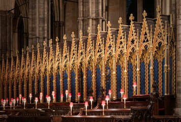 Choir seats illuminated at night at Westminster Abbey, London