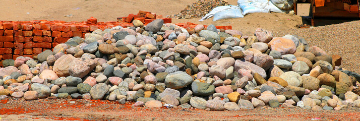 a pile of stones that is withdrawn from river.