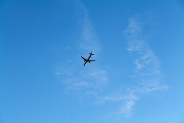 Low angle view of airplane against the sky with space for text. High-quality photo