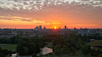 Fototapeta na wymiar Sunrise behind the skyline of The Hague, Netherlands