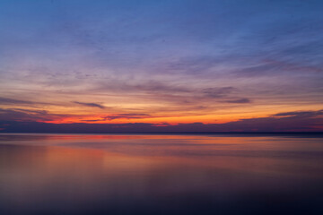 Naklejka na ściany i meble Panoramic view of seascape sunset at the Atlantic Ocean in Woodland State Park, Long Island the USA. High-quality photo