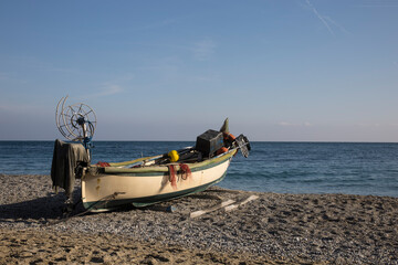 Boat on the beach.
Fishing boat with its equipment on the beach.