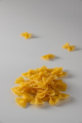 Farfalle pasta on a white background