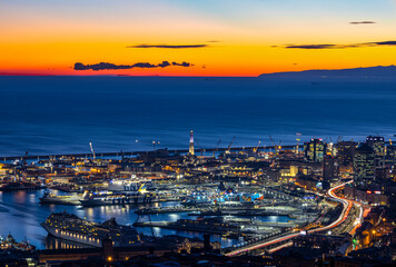GENOA (GENOVA), ITALY, JANUARY 10, 2022 - Aerial view of the city of Genoa (Genova) at dusk, Italy.