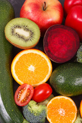 Fruits with vegetables, nutritious dessert containing minerals and vitamins