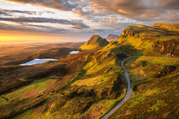Dramatic views of sunrise over Trotternish Ridge seen from The Quiraing on the Isle of Skye,...