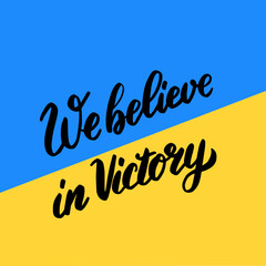 We believe in Victory. Lettering calligraphy on Ukraine blue yellow flag background.