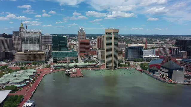 Aerial panoramic view of Baltimore City, Maryland, MD Inner Harbor with buildings, fells point, little italy.