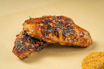 BBQ chicken wings on kraft paper