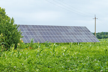 Solar panels set near a rustic house.