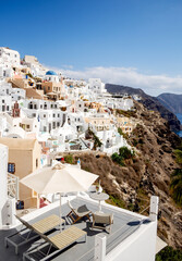 Oia, Greece - October 8, 2021:View of Oia the most beautiful village of Santorini island in Greece during summer.