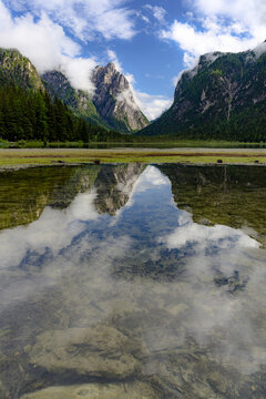 Clear water of Lake Dobbiaco (Toblacher See) in spring, Dolomites, Puster valley, Bolzano province, South Tyrol, Italy