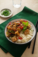 Tofu with white rice, stir fry tofy meat in bowl. Healthy vegan lifestyle food