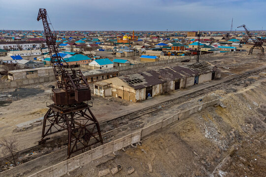 Aerial of the Aral Lake and Aralsk, with its rusty cranes, Aral lake, Kazakhstan