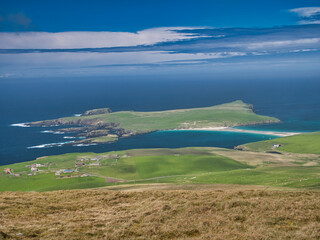 An aerial view of St Ninian's Isle on the west coast of Mainland, Shetland, UK. Taken from the Ward...