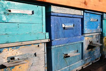 Beehives in the apiary. Bee houses made of wood.