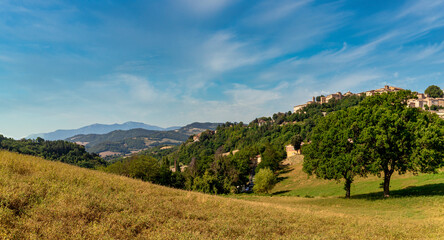 The landscape with the colors of summer around the city of Urbino, Urbino, Marche, Italy