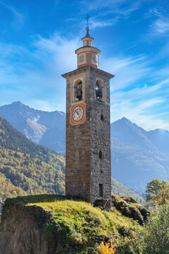 The stone bell tower of the parish church of Croveo, Baceno, Valle Antigorio, Verbano Cusio Ossola district, Piedmont, Italy