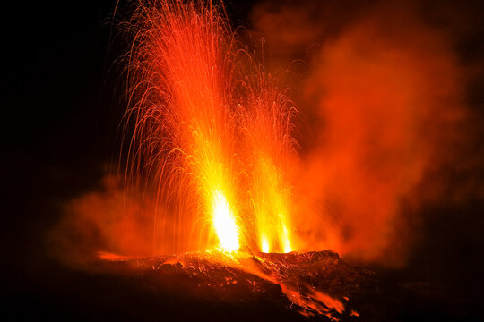 Lava bombs erupt from multiple vents on this volcano, active for at least 2000 years, Stromboli, Aeolian Islands, UNESCO World Heritage Site, Sicily, Italy