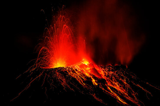 Lava bombs erupt from multiple vents on volcano, active for at least 2000 years, Stromboli, Aeolian Islands, UNESCO World Heritage Site, Sicily, Italy