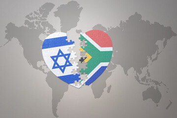 puzzle heart with the national flag of south africa and israel on a world map background.Concept.