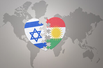 puzzle heart with the national flag of kurdistan and israel on a world map background.Concept.
