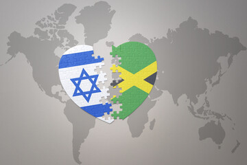 puzzle heart with the national flag of jamaica and israel on a world map background.Concept.