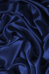 Red silk or satin luxury fabric texture can use as abstract background.