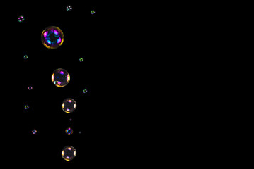 Soap bubbles isolated on a black background
