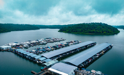 Taylorville lake marina in central Kentucky. Boats lined on the docks in front of lake curves and...