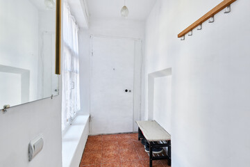 Fototapeta na wymiar Photo of a hallway in a one-room apartment 