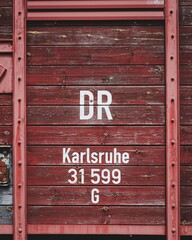 Closeup of  a red wagon with the sign 