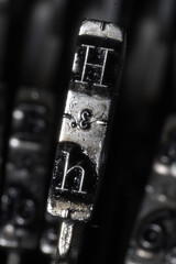 Letter H in a typo of an old manual typewriter