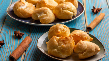 Profiteroles stuffed with cream, homemade bakery. close up