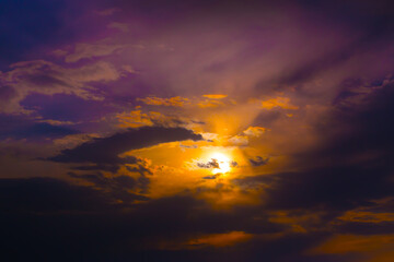 bright sunset in cloudy sky
