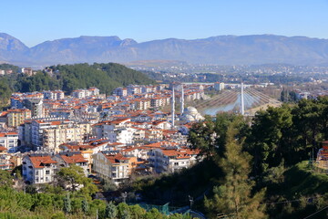 Manavgat city aerial panoramic view in Antalya region in Turkey from the Türkbeleni Ormani, turkish flag monument