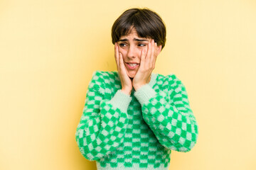 Young caucasian woman with a short hair cut isolated scared and afraid.