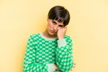 Young caucasian woman with a short hair cut isolated tired of a repetitive task.
