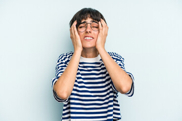 Young caucasian woman with a short hair cut isolated crying, unhappy with something, agony and confusion concept.