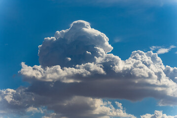 Big, fluffy clouds billowing 