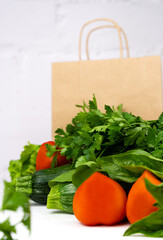 Fresh vegetables on the table. Delivery of fresh vegetables from the store. Close-up. Selective focus.