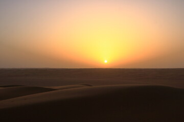 Fototapeta na wymiar sunset in the desert Wahiba Sands in Oman