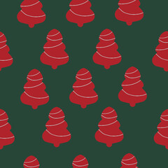 Red christmas trees on green background seamless pattern