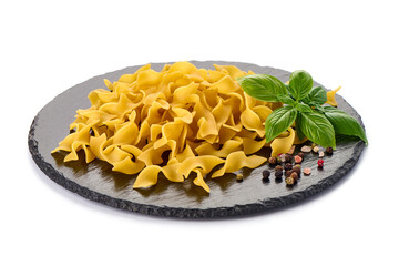 Italian Tagliatelle Pasta. Egg Pasta, Isolated on White Background. Dry Short Fettuccine Macarons.