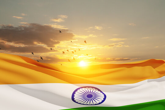 Waving India flag on sunset sky with flying birds. Background with place for your text. Indian independence day, 15 August. 3d-rendering.
