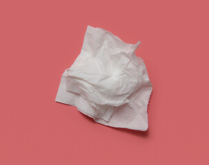 Sheet white toilet paper on pink background