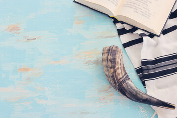religion image of shofar (horn) on white prayer talit. Rosh hashanah (jewish New Year holiday),...