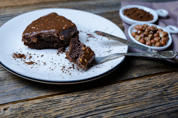 Homemade delicious cake with chocolate hazelnuts, sliced chocolate cake.