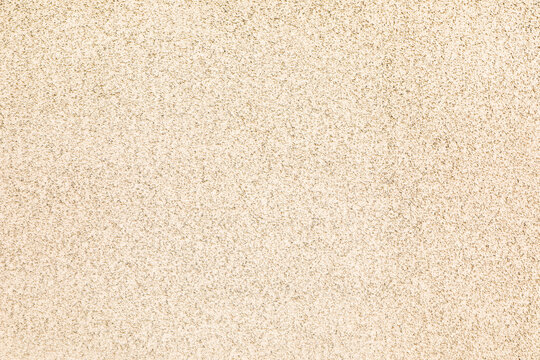 Texture of beige plaster wall as background